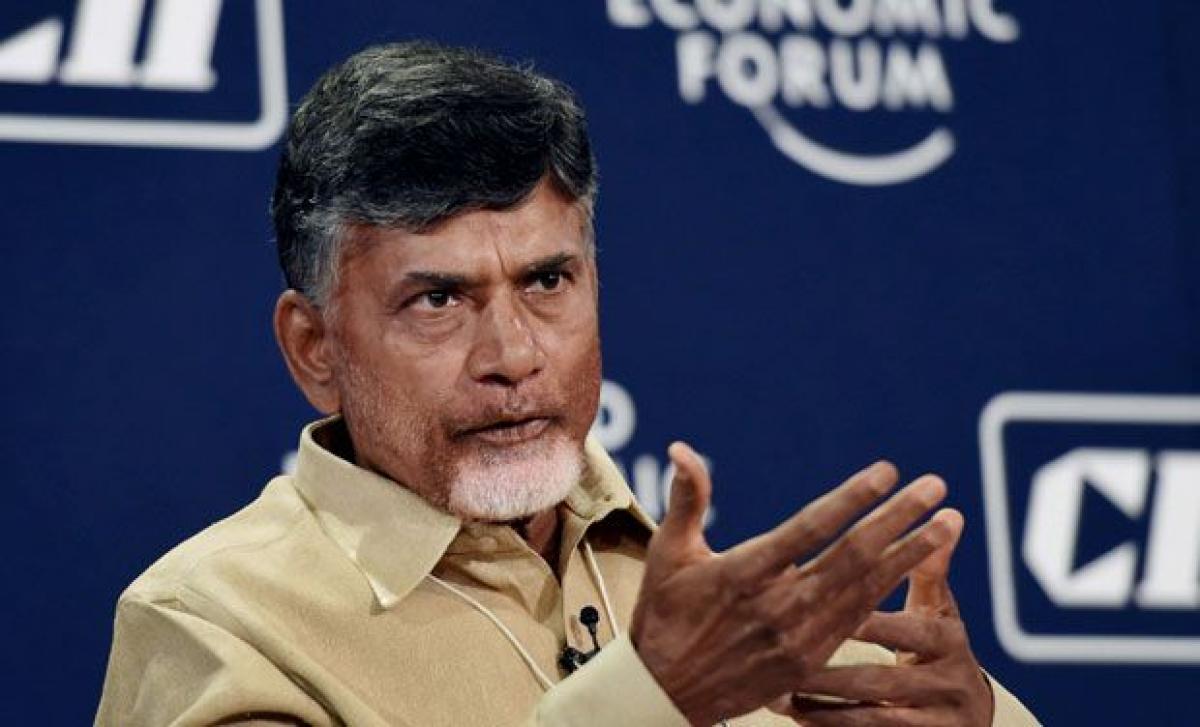 Chandrababu proposes to distribute free mobiles for cashless transactions