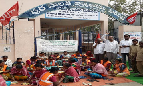 Sanitary workers stage dharna at Meerpet Municipality