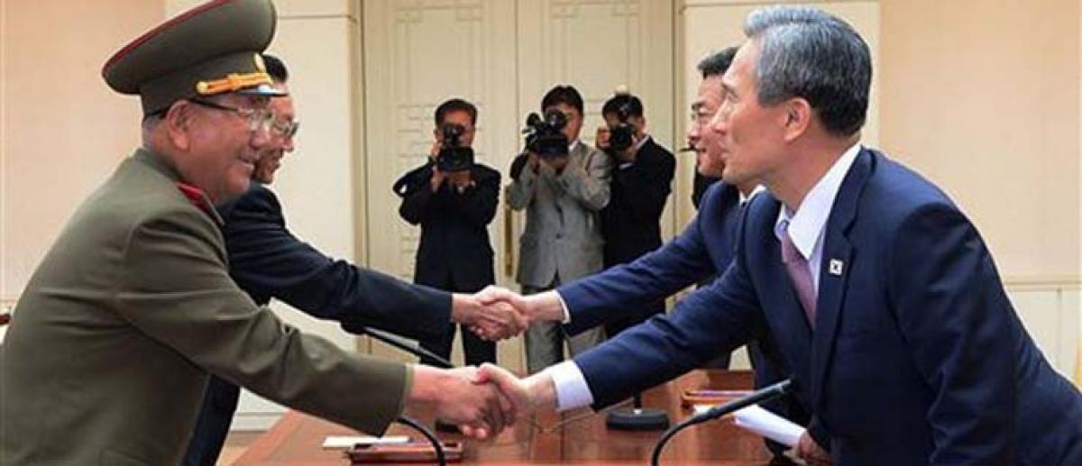 Rival Koreas agree to end standoff over exchange of artillery fire