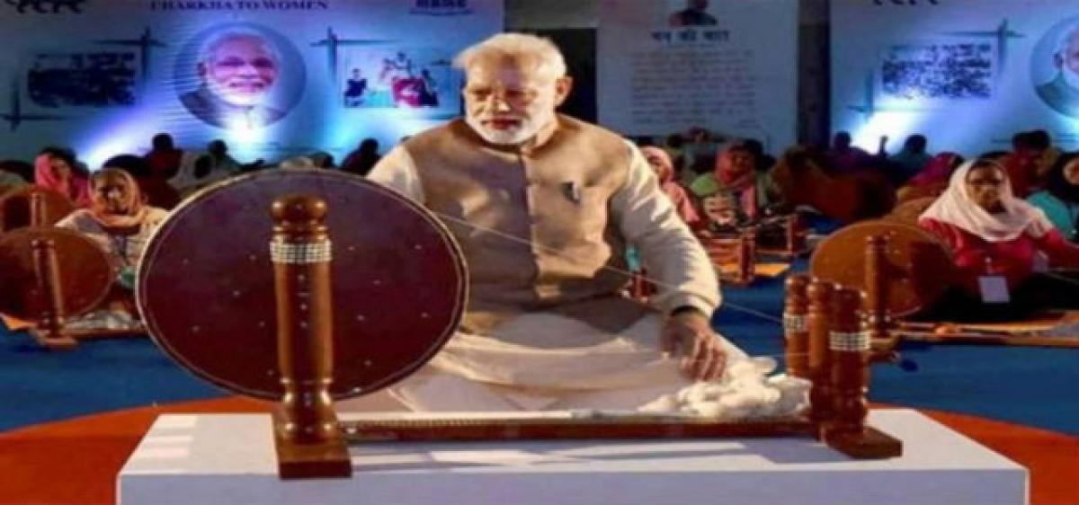 Modi photo on khadi diary sparks row