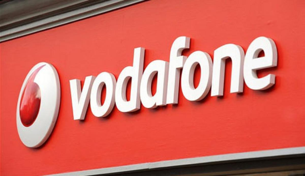 India signs six deals with Britain, including Vodafone investment