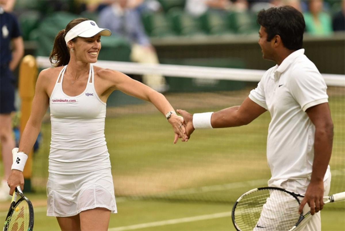 Paes, Hingis bask in Wimbledon glory