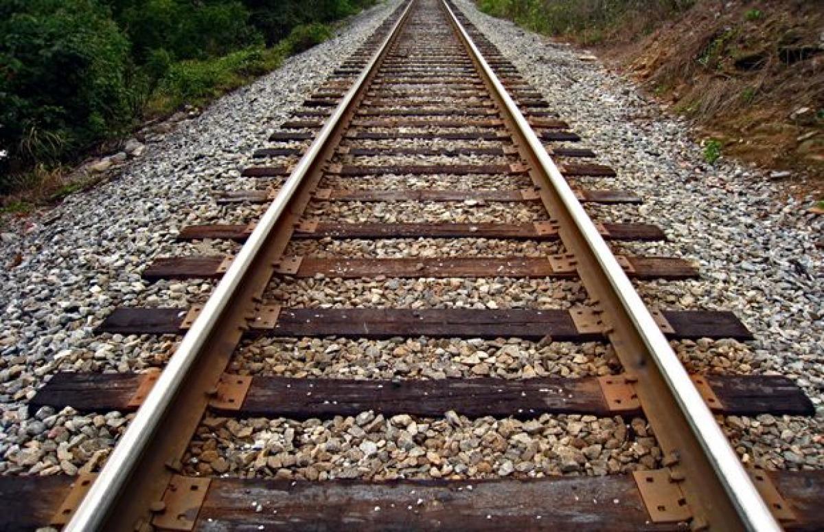 Drunk man sleeps on track, escapes unhurt as train passes over him