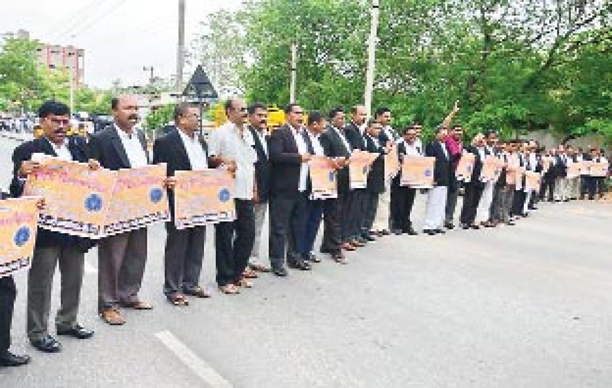 Advocates block road