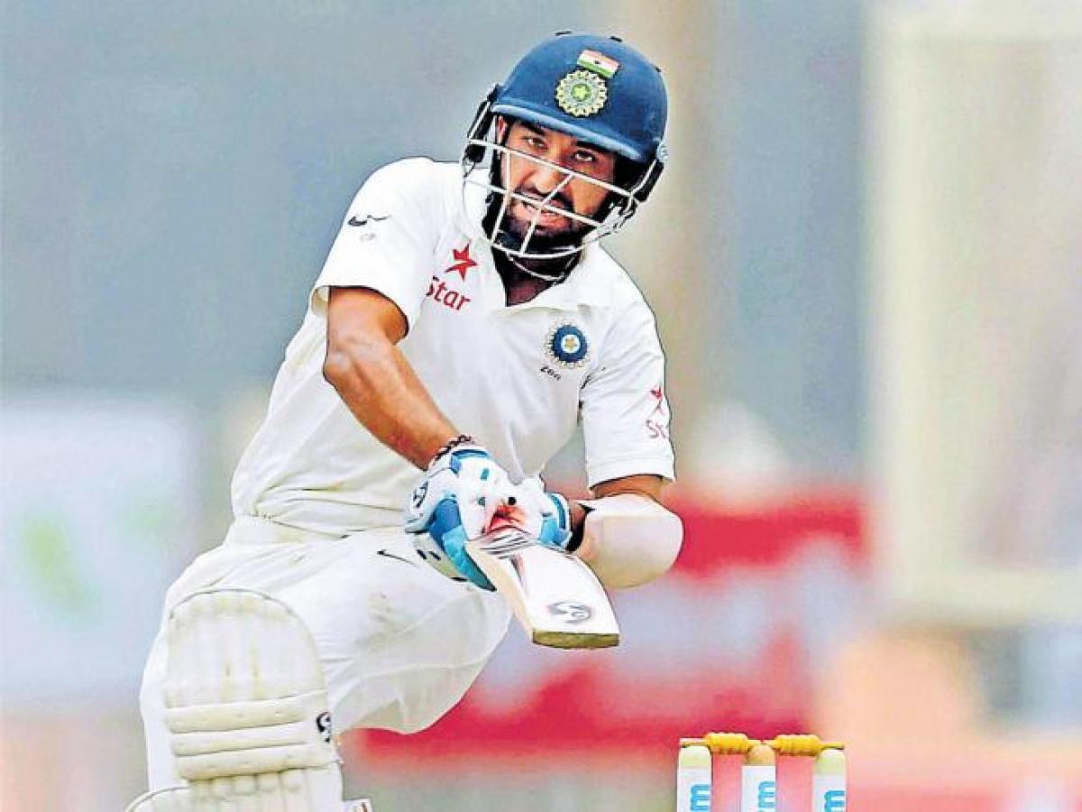 Pujara stays firm as India post 153/2 at tea