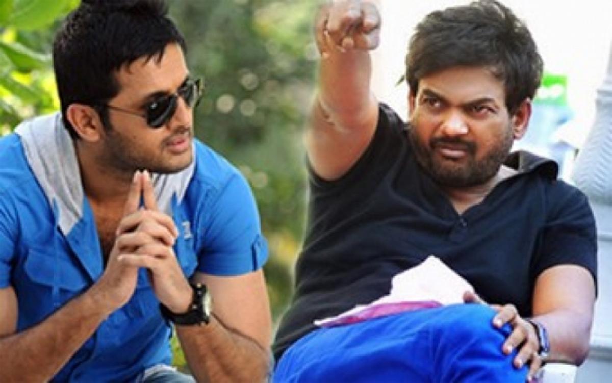 Charmmee behind Nithiin-Puri clash?