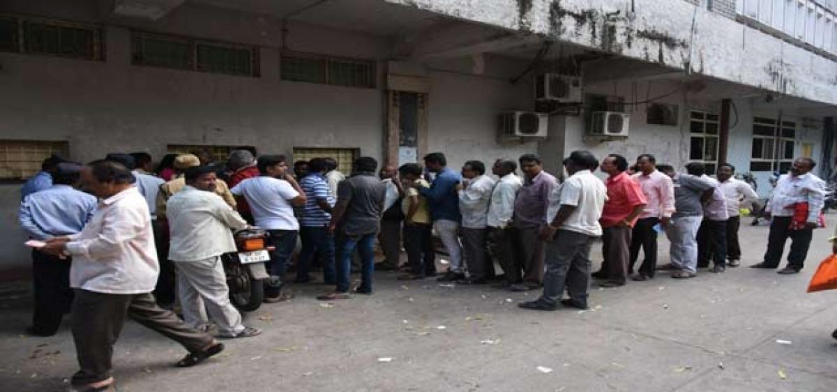 Outsourced GHMC staff cry foul over salary