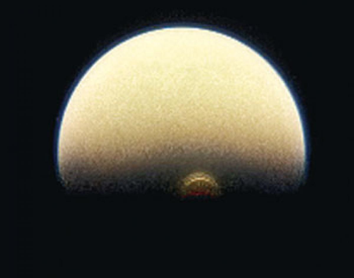 NASAs Cassini spots monstrous ice cloud on Titan