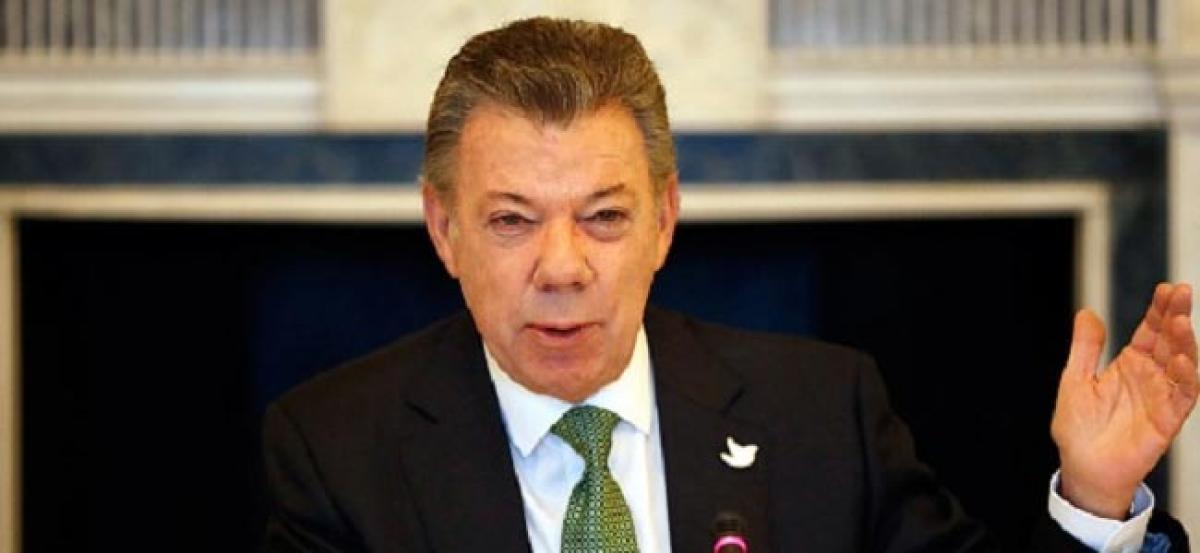 Colombian president Juan Manuel Santos laments plane crash that killed 71