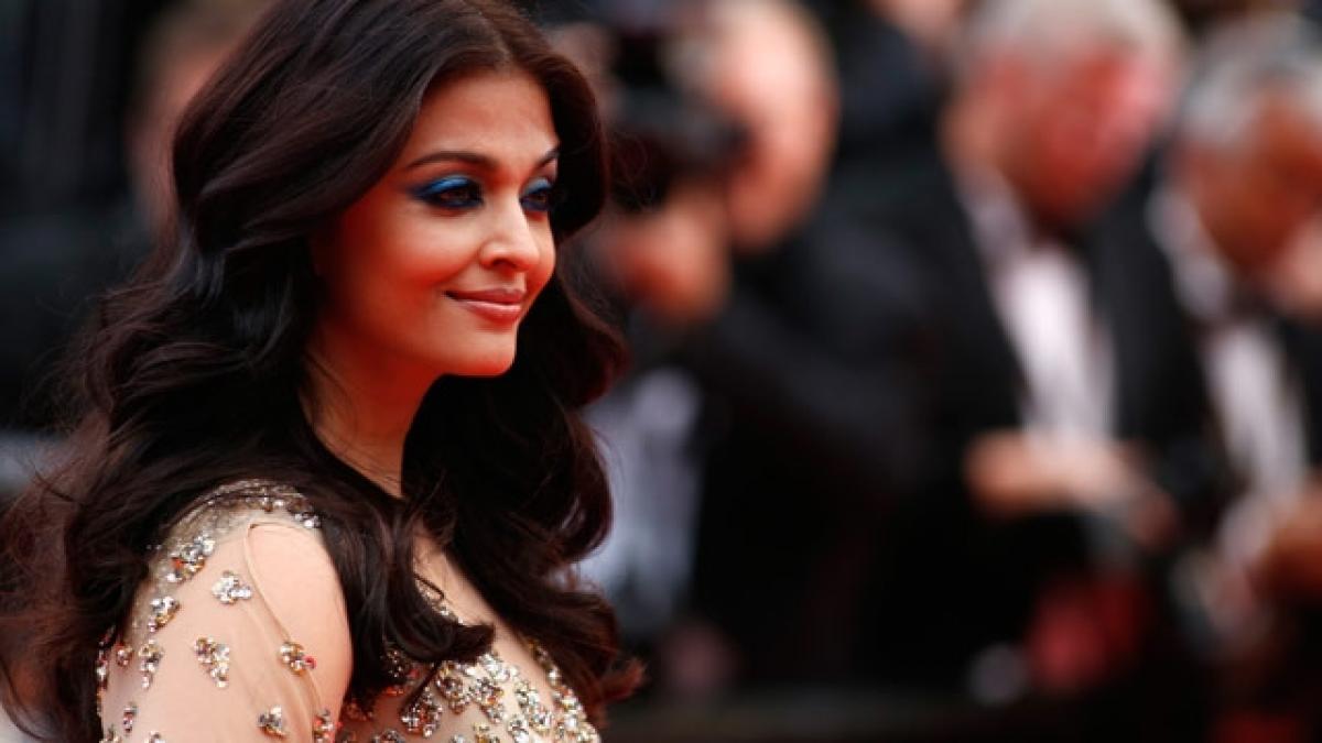 Aishwaryas Cannes red carpet look floors hubby Abhishek