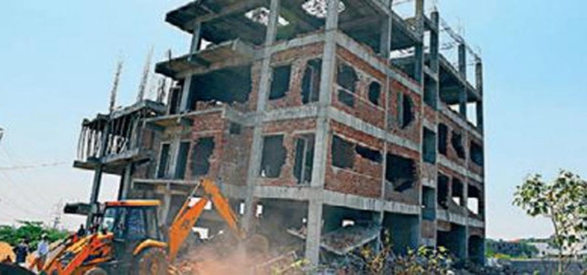 3 injured as GHMC implodes illegal structure