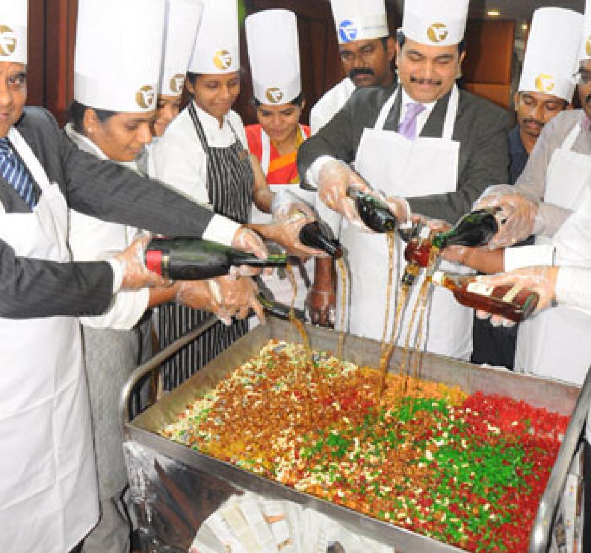 Vijayawada: Cake mixing ceremony signals that Christmas is near | News -  Times of India Videos