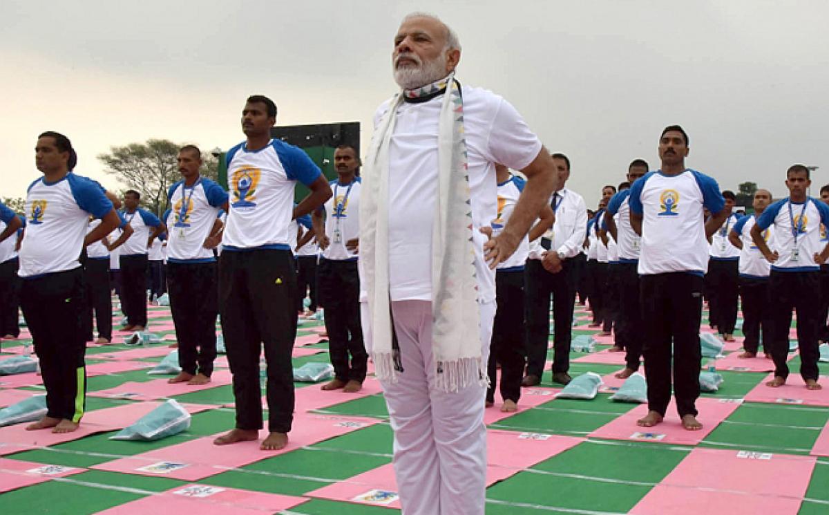 Want health on zero budget? Practise Yoga, says Modi