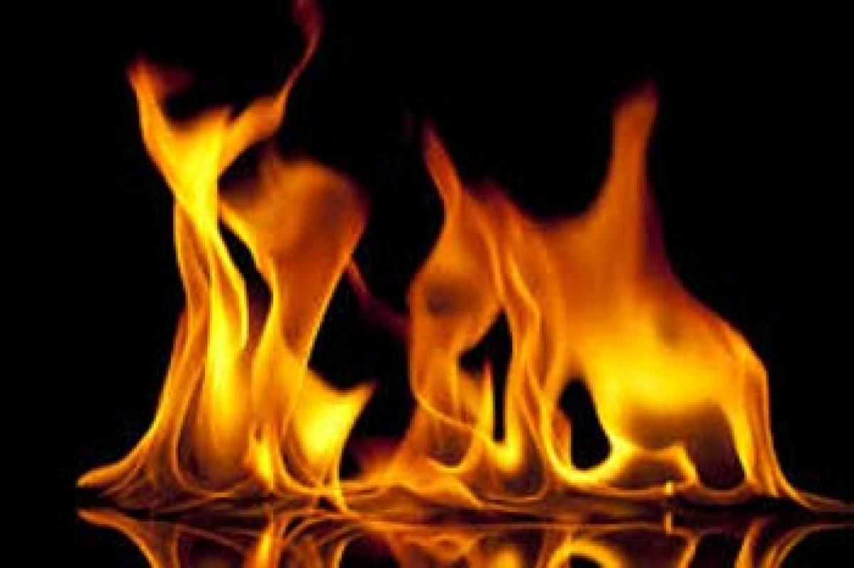 Man sets father, self on fire