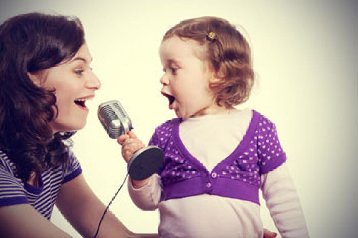 Singing keeps infants calm longer than baby-talk
