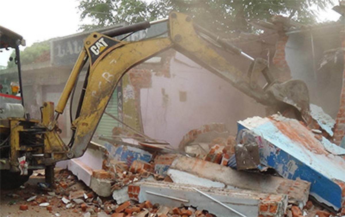 SCB demolishes illegal structures