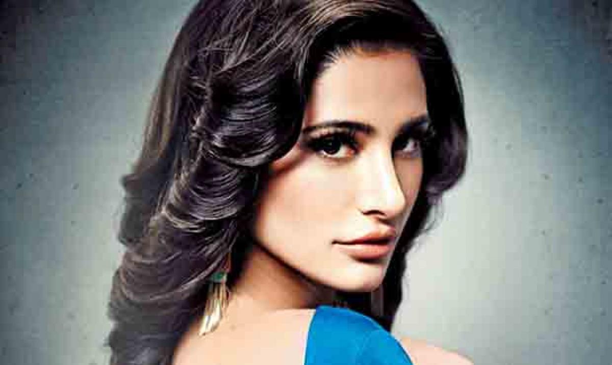 Nargis Fakhri needs a dog not a man in her life