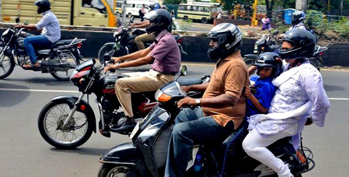 AP Govt puts compulsory helmet rule on hold