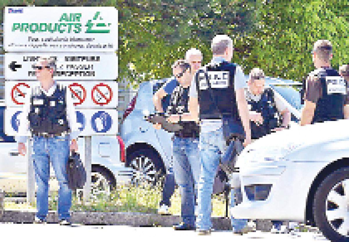 One beheaded, several hurt in French factory attack