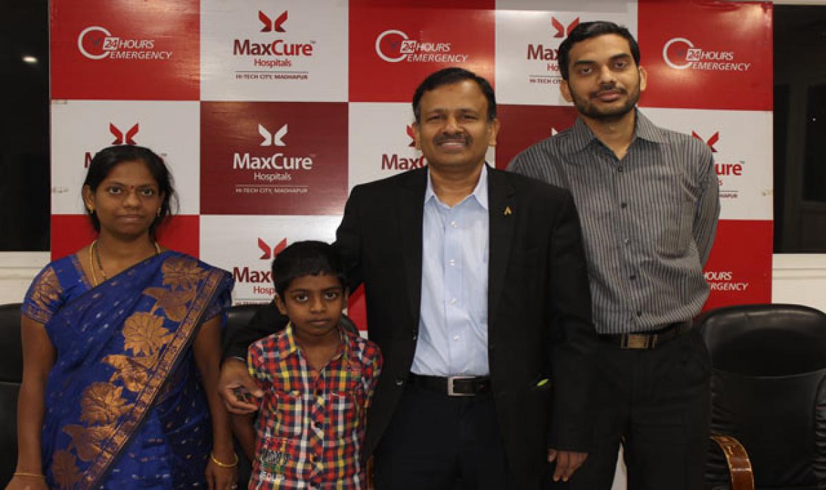 Doctors perform a life-saving spine surgery on a 11-yr-old boy