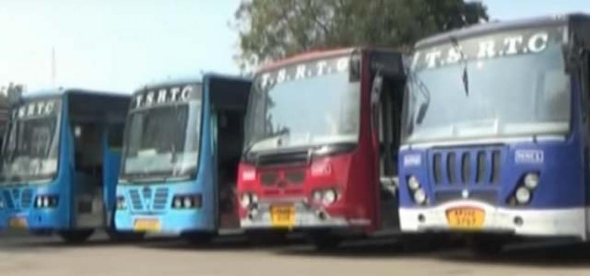 TSRTC employees stage protest at Mancherial bus depot