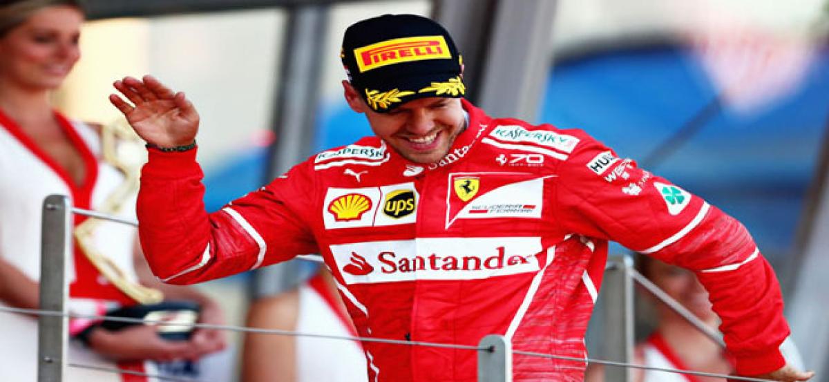 Vettel joins Schumi league