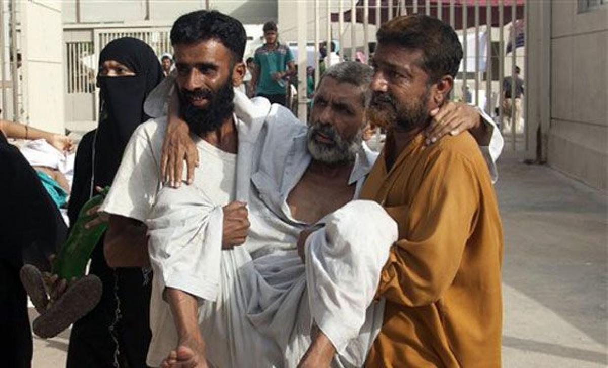 Weeklong heat weave in southern Pakistan kills 1,233 people