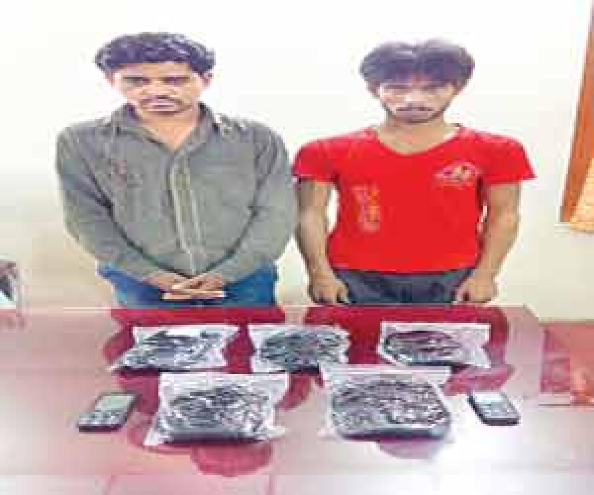 Two drug peddlers held