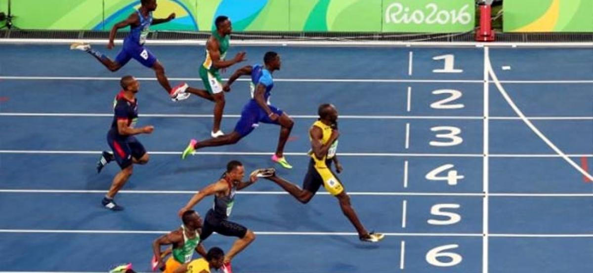 Imperious Bolt completes amazing 100m triple