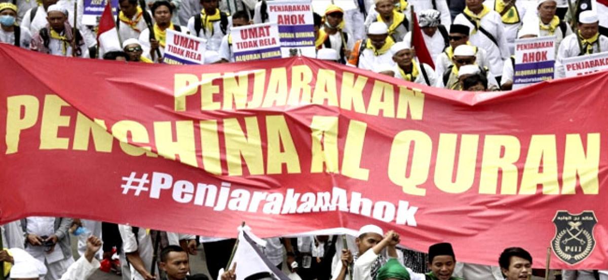 Tens of thousands protest in Jakarta amid fury over Christian governor