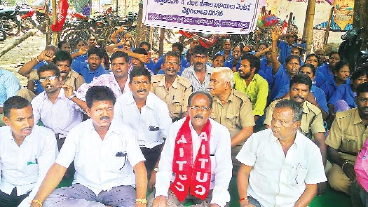 Contract outsourcing staff of Government General Hospital stage dharna for pending salaries