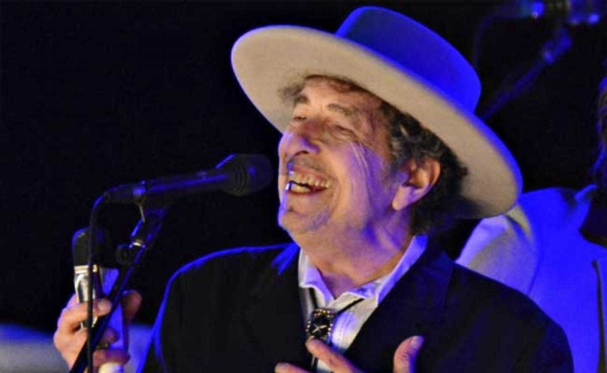 Singer-Songwriter Bob Dylan The Enigmatic Accepts 2016 Nobel Prize At Last