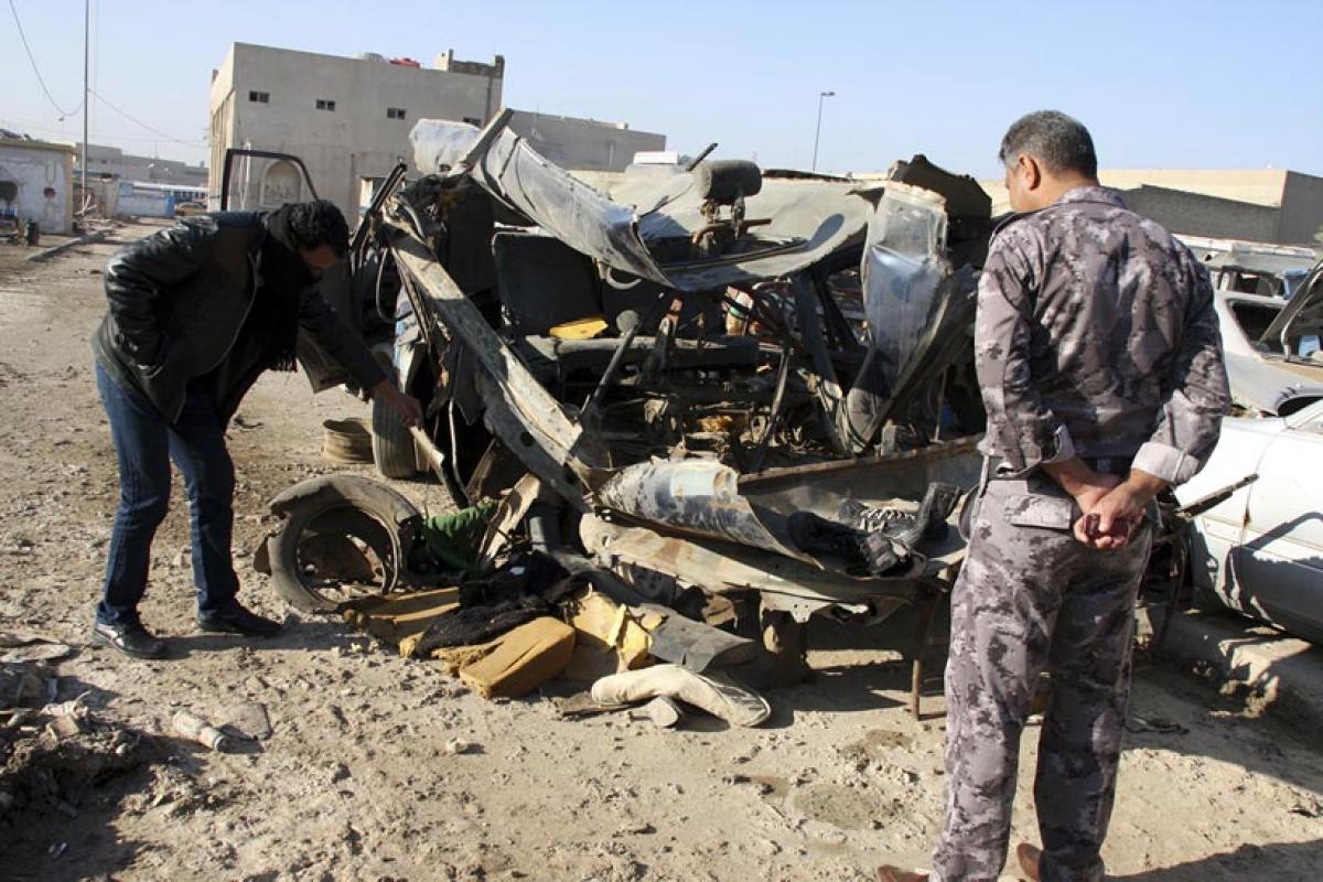 Car bomber targets shrines, kills 9 at Tikrit checkpoint