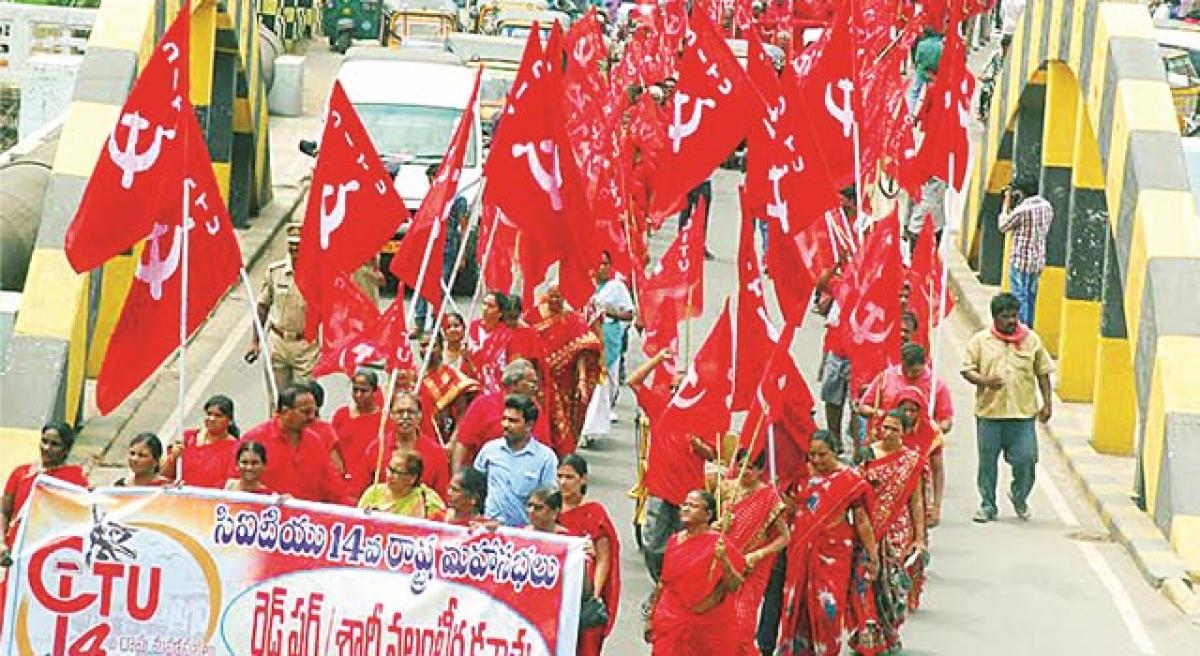 Red shirt volunteers take out rally