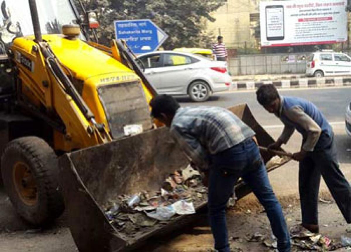 Sanitation workers raise a stink over salaries
