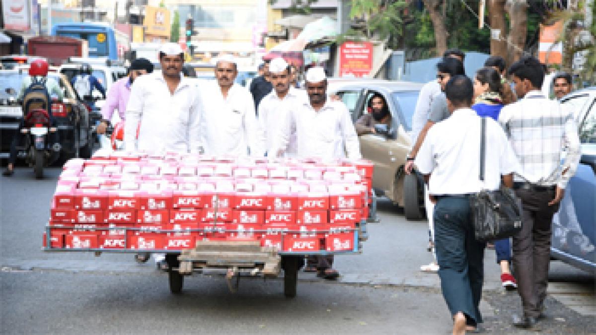 Mumbai Dabbawalas deliver KFCs 5-in-one meal box