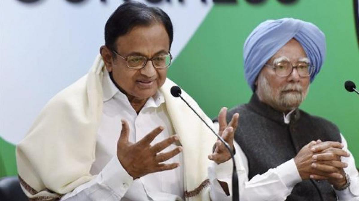 Manmohan, Chidambaram trying to give wrong message to investors: BJP