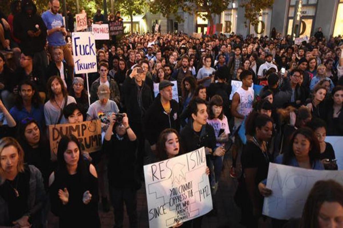 Thousands of demonstrators take to the streets to protest Trump victory