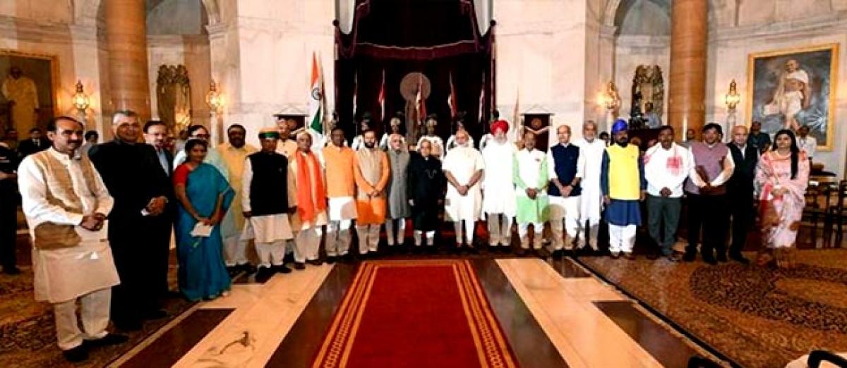 Modi inducts 19 new faces, axes five ministers