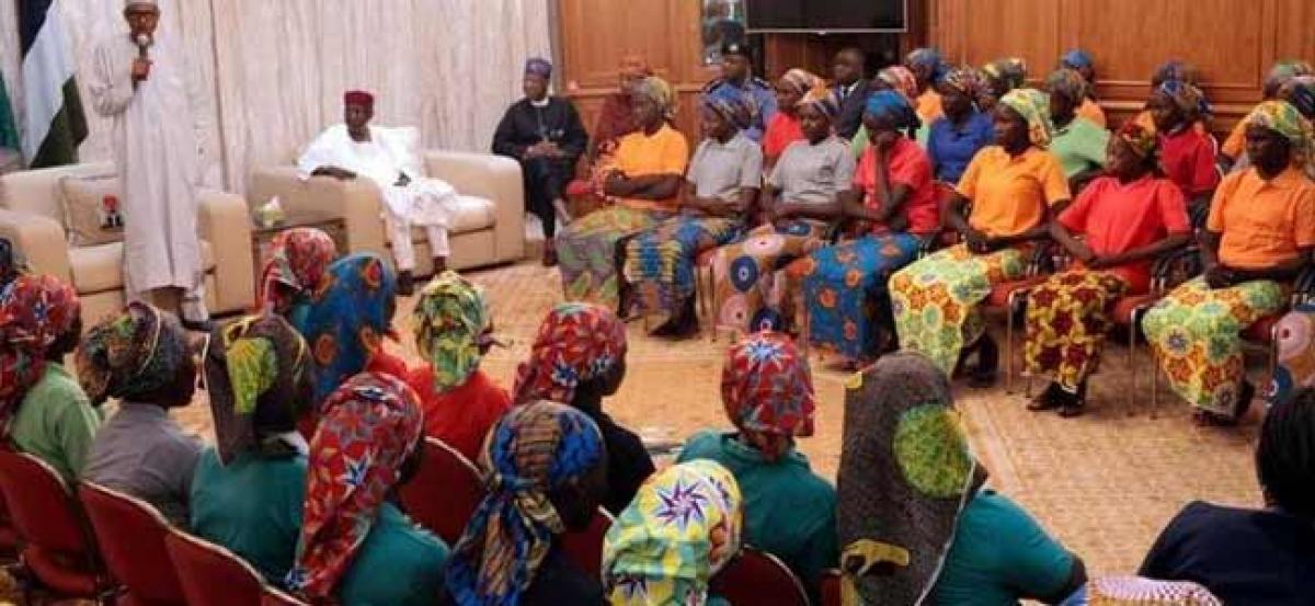 Welcome our dear girls, Nigerias Buhari tells freed Chibok girls