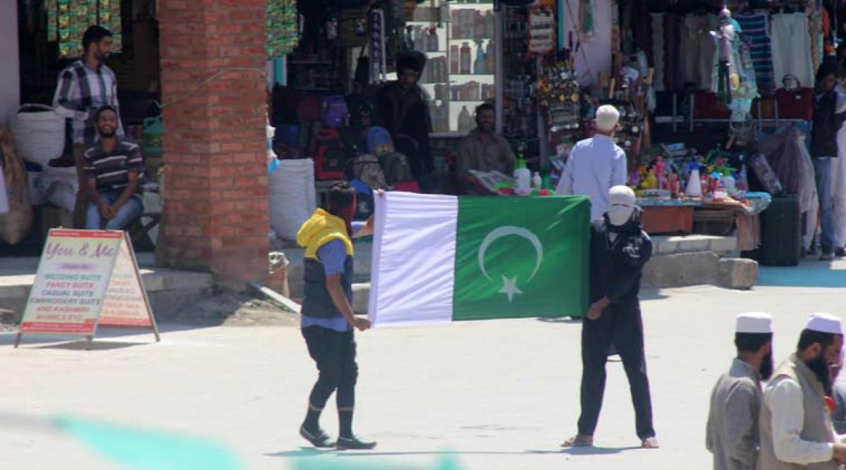 Clashes in Kashmir after Eid prayers, protesters wave Pakistani flags