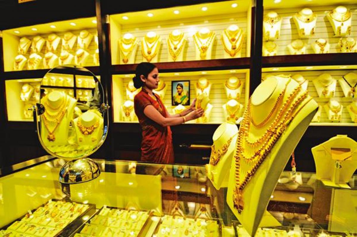 Gold glitters, silver recovers