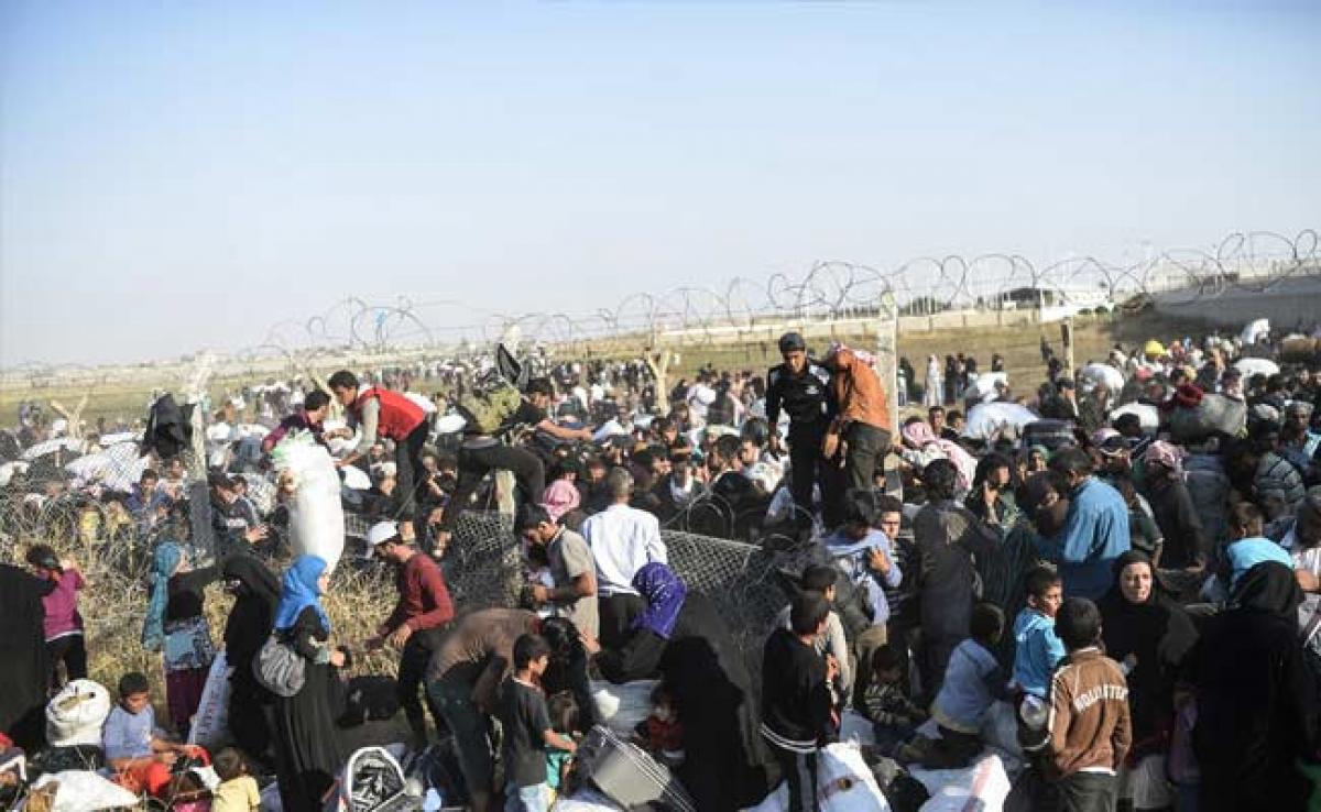Syrian Refugees Register on Greek Ship Docked at Kos