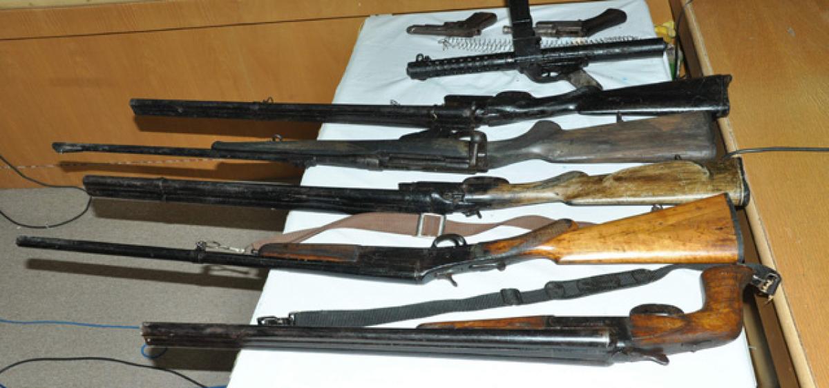 1 fake naxal held; huge cache of arms recovered