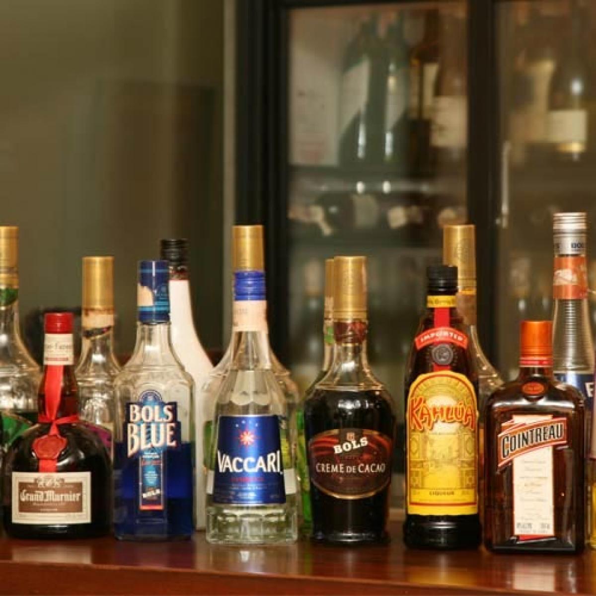 Officials conduct raids on illicit liquor units