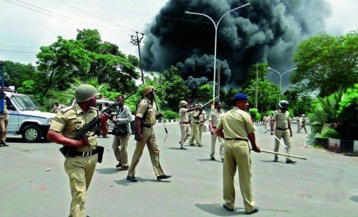 Curfew in Narendra Modis home state Gujarat