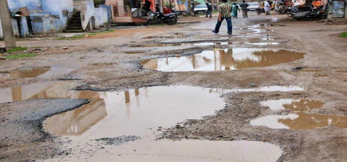 GHMC blames rains for pathetic roads, potholes