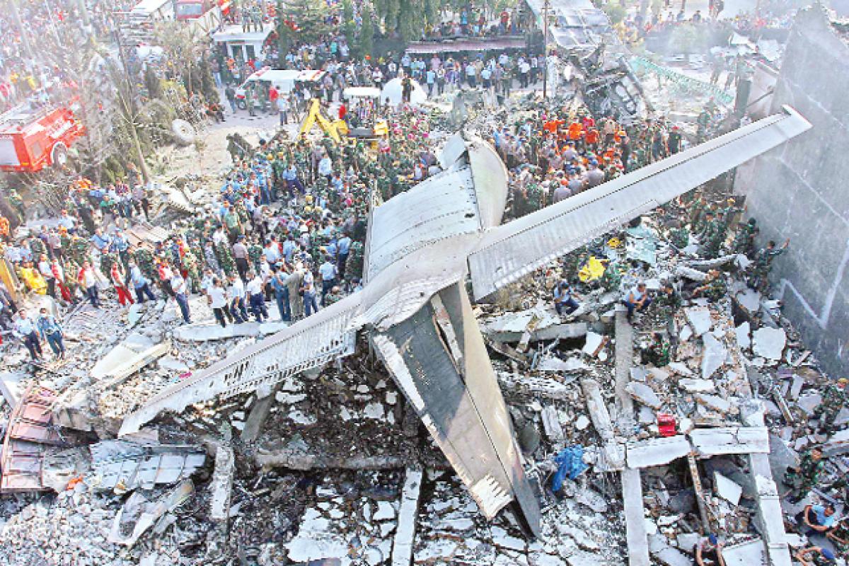 Indonesian military plane crashes in city; 116 dead