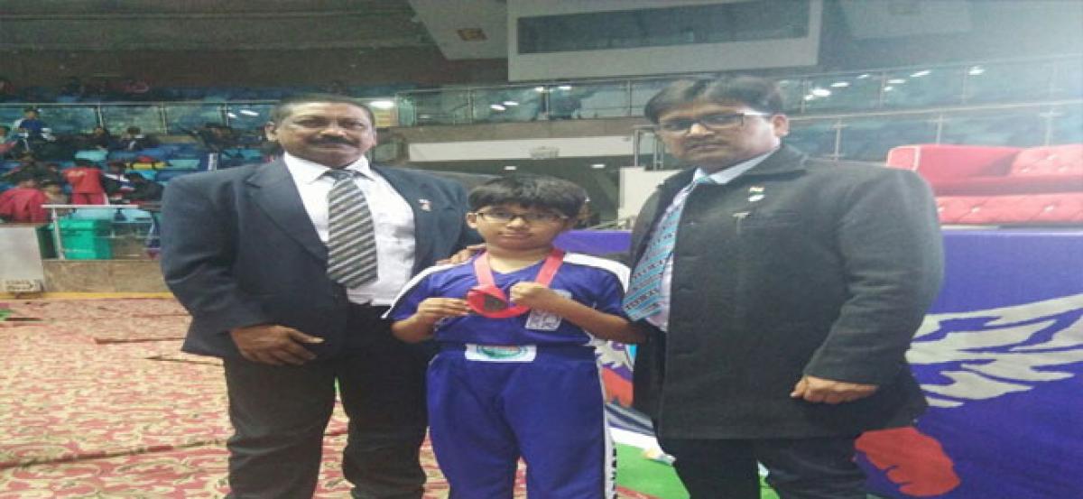 City kid participates in national-level kick boxing tourney
