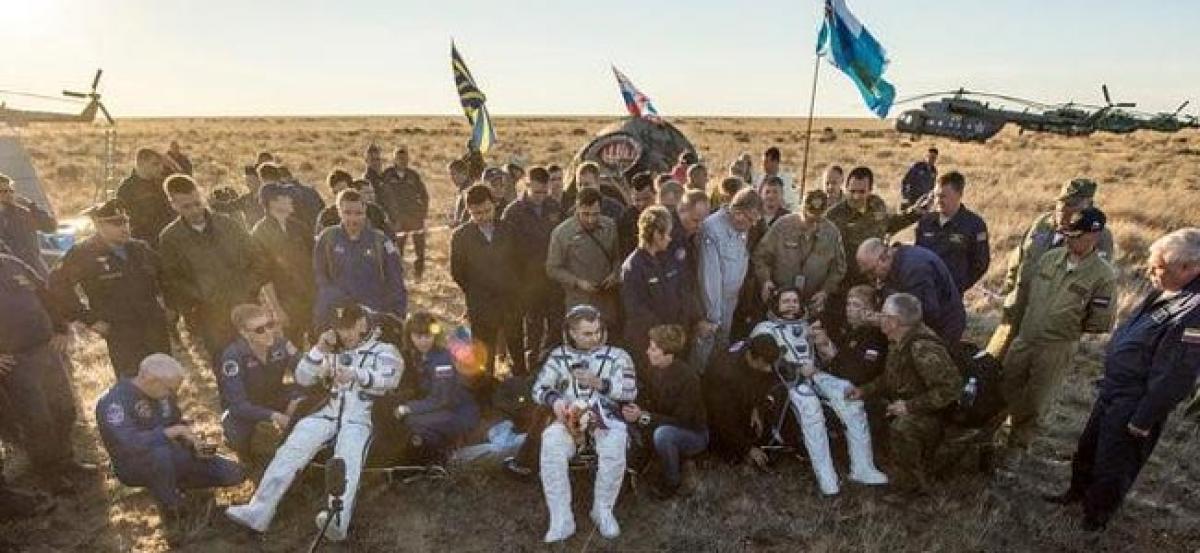 U.S.-Russian crew lands in Kazakhstan after 172 days in space